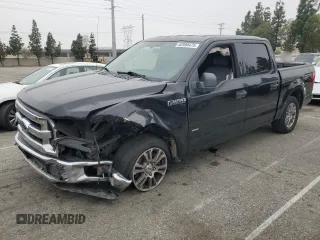2015 Ford F-150 XL with VIN 1FTEW1CG0FKD03070, listed as a Copart auction lot 52990475 with 102,844 mi miles and Salvage title. Bid and sale history available at DreamBid. Image 1.