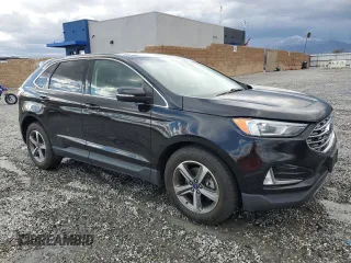 2019 Ford Edge SEL with VIN 2FMPK3J92KBC74322, listed as a Copart auction lot 48760065 with 62,949 mi miles and Salvage title. Bid and sale history available at DreamBid. Image 4.