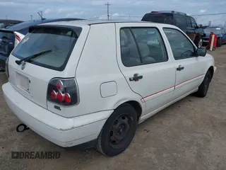1998 Volkswagen Golf z VIN 3VWFA81H3WM214221, wystawiony jako IAAI lot #41855357 z przebiegiem 213 203 mil mil oraz . Historia ofert i sprzedaży dostępna na DreamBid. Obrazek 4.