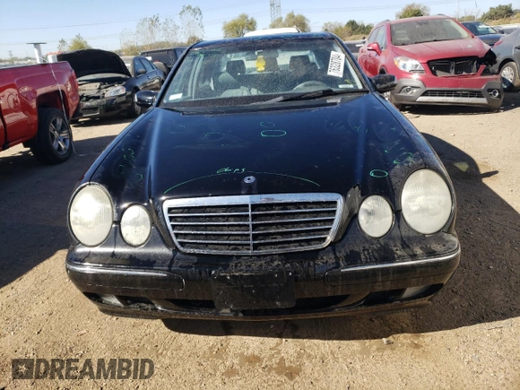 2001 Mercedes-Benz E-Class with VIN WDBJF65J01B325792, listed as a Copart auction lot 76328704 with 101,886 mi miles and Salvage Title. Bid and sale history available at carsss.com. Image 5.