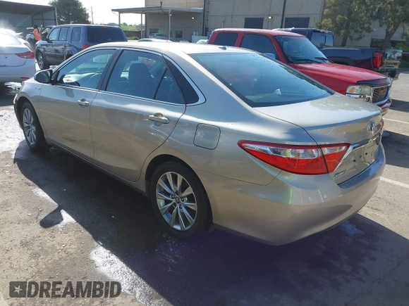 2015 Toyota Camry LE z VIN 4T1BD1FK1FU174975, wystawiony jako IAAI lot #42085034 z przebiegiem 54 728 mil mil oraz . Historia ofert i sprzedaży dostępna na DreamBid. Obrazek 3.