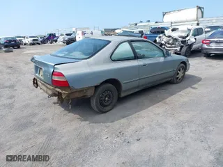 1995 Honda Accord Cpe EX with VIN 1HGCD7252SA016119, listed as a IAAI auction lot 41594325 with 231,799 mi miles. Bid and sale history available at carsss.com. Image 4.