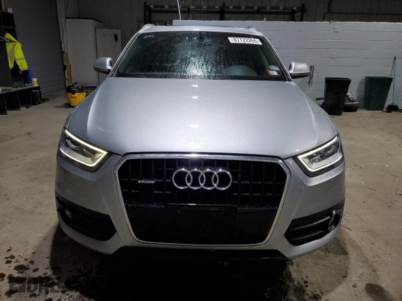 2015 Audi Q3 2.0T Prestige with VIN WA1GFCFS3FR013637, listed as a Copart auction lot 87722265 with 123,721 mi miles and Salvage Title. Bid and sale history available at carsss.com. Image 5.
