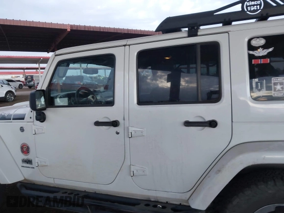 2014 Jeep Wrangler Unlimited Sahara with VIN 1C4BJWEG7EL204489, listed as a IAAI auction lot 41255239 with 68,803 mi miles and . Bid and sale history available at DreamBid. Image 14.