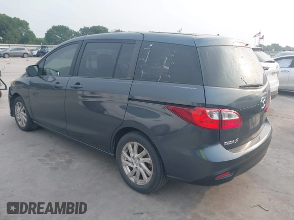 2012 Mazda 5 Sport with VIN JM1CW2BL6C0134921, listed as a IAAI auction lot 42290476 with 128,490 mi miles and . Bid and sale history available at DreamBid. Image 3.