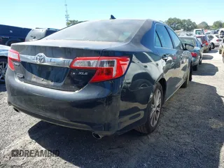 2012 Toyota Camry SE with VIN 4T1BK1FK2CU521649, listed as a IAAI auction lot 41852769 with 260,239 mi miles. Bid and sale history available at carsss.com. Image 4.