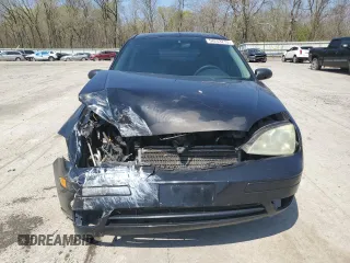 2005 Ford Focus S z VIN 3FAFP31N65R153304, wystawiony jako Copart lot #54253215 z przebiegiem 148 707 mil mil oraz Szkoda całkowita • Salvage title. Historia ofert i sprzedaży dostępna na DreamBid. Obrazek 5.
