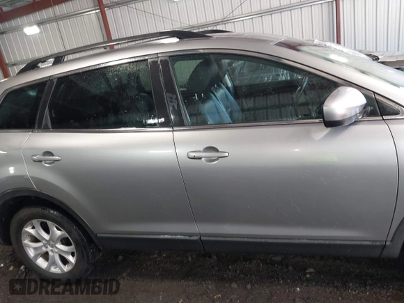2011 Mazda CX-9 Touring with VIN JM3TB3CV6B0307358, listed as a IAAI auction lot 41979197 with 128,471 mi miles. Bid and sale history available at carsss.com. Image 13.