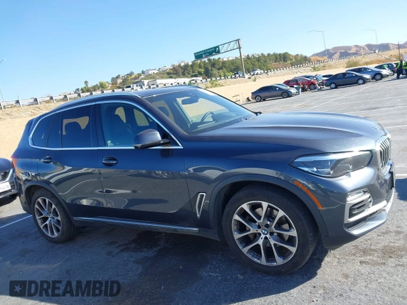 2021 BMW X5 sDrive40i with VIN 5UXCR4C00M9F94906, listed as a IAAI auction lot 41359872 with 37,161 mi miles. Bid and sale history available at carsss.com. Image 13.