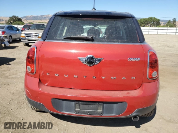 2014 MINI Countryman with VIN WMWZB3C5XEWR42035, listed as a Copart auction lot 61846725 with 105,131 mi miles and Salvage title. Bid and sale history available at DreamBid. Image 6.