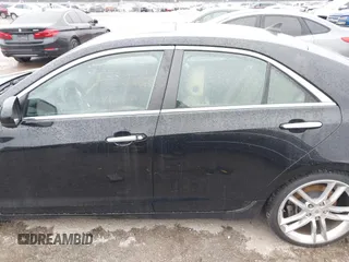 2014 Cadillac ATS Standard RWD with VIN 1G6AA5RX5E0104427, listed as a IAAI auction lot 41542467 with 83,351 mi miles and . Bid and sale history available at DreamBid. Image 14.