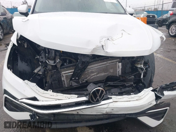 2022 Volkswagen Tiguan S z VIN 3VV1B7AXXNM149461, wystawiony jako IAAI lot #41746132 z przebiegiem 22 832 mil mil oraz . Historia ofert i sprzedaży dostępna na DreamBid. Obrazek 6.