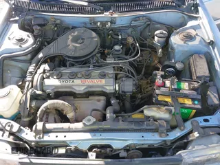 1989 Toyota Corolla with VIN JT2AE92E6K3221552, listed as a IAAI auction lot 41645601 with 634,636 mi miles and . Bid and sale history available at DreamBid. Image 10.