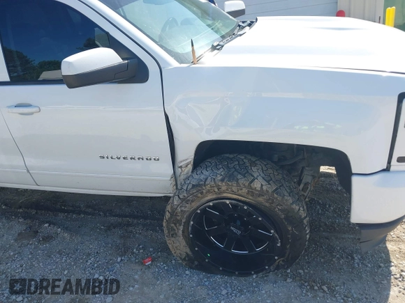 2016 Chevrolet Silverado 1500 LT with VIN 1GCVKREC4GZ106299, listed as a IAAI auction lot 41984118 with 181,626 mi miles and . Bid and sale history available at DreamBid. Image 6.