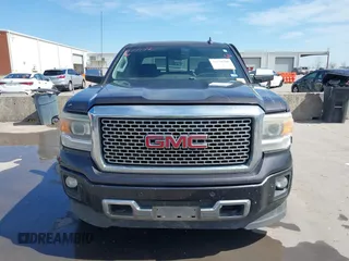 2015 GMC Sierra 1500 Denali with VIN 3GTU2WEJ2FG509236, listed as a IAAI auction lot 41771790 with 219,043 mi miles. Bid and sale history available at carsss.com. Image 12.