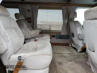 1991 Chevrolet Chevy Van z VIN 1GBEG25K9M7125247, wystawiony jako Copart lot #75549674 z przebiegiem 108 756 mil mil oraz Czysty tytuł • Clean title. Historia ofert i sprzedaży dostępna na DreamBid. Obrazek 11.