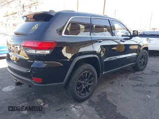 2021 Jeep Grand Cherokee Laredo X with VIN 1C4RJEAG7MC538812, listed as a IAAI auction lot 41337593 with 68,865 mi miles and . Bid and sale history available at DreamBid. Image 4.