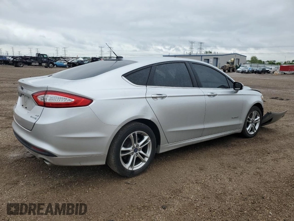 2013 Ford Fusion SE Hybrid с VIN 3FA6P0LU9DR233472, выставлен на аукционе Copart как лот 57994345 с пробегом 194 862 миль миль и Списание • Salvage title. История ставок и продаж доступна на DreamBid. Изображение 3.