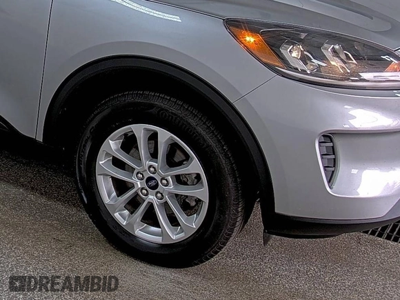 2022 Ford Escape SE with VIN 1FMCU9G65NUB32764, listed as a IAAI auction lot 42806882 with 81,565 mi miles and . Bid and sale history available at DreamBid. Image 5.