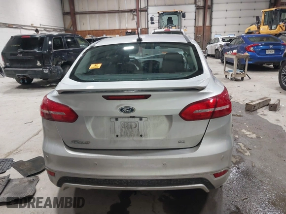 2015 Ford Focus SE with VIN 1FADP3F24FL272863, listed as a IAAI auction lot 41561084 with 103,875 mi miles. Bid and sale history available at carsss.com. Image 17.