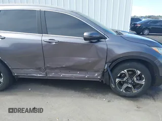 2018 Honda CR-V Touring with VIN 7FARW1H9XJE018575, listed as a IAAI auction lot 41747192 with 83,699 mi miles and . Bid and sale history available at carsss.com. Image 6.