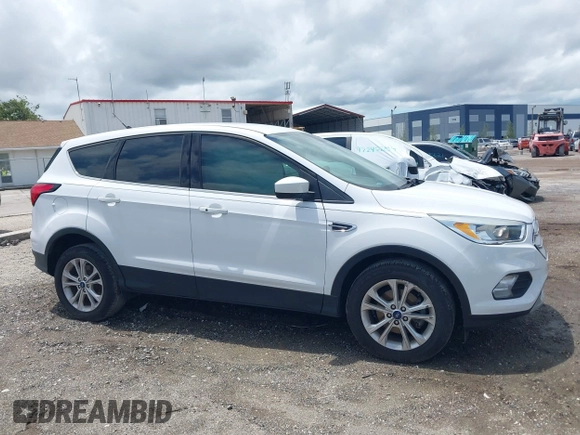 2019 Ford Escape SE z VIN 1FMCU0GD1KUA12322, wystawiony jako IAAI lot #42232033 z przebiegiem 141 764 mil mil oraz . Historia ofert i sprzedaży dostępna na DreamBid. Obrazek 13.