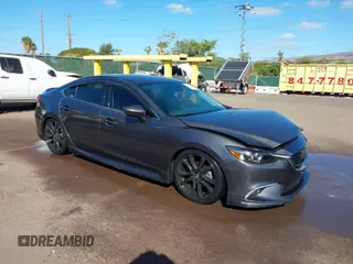 2016 Mazda Mazda6 i Grand Touring with VIN JM1GJ1W57G1479543, listed as a IAAI auction lot 41371653 with 83,741 mi miles. Bid and sale history available at carsss.com. Image 1.