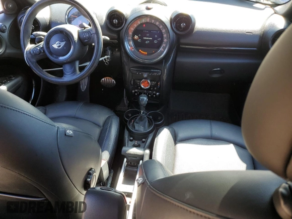 2016 MINI Countryman S with VIN WMWZC5C56GWP49473, listed as a Copart auction lot 50752355 with 118,060 mi miles and Salvage Title. Bid and sale history available at DreamBid. Image 8.