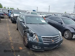 2011 Cadillac CTS z VIN 1G6DL8EY1B0112267, wystawiony jako IAAI lot #42013430 z przebiegiem 133 627 mil mil oraz . Historia ofert i sprzedaży dostępna na DreamBid. Obrazek 1.