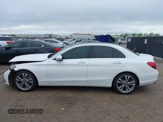 2018 Mercedes-Benz C C 300 with VIN 55SWF4JB1JU237940, listed as a IAAI auction lot 41911087 with 57,362 mi miles and . Bid and sale history available at carsss.com. Image 14.
