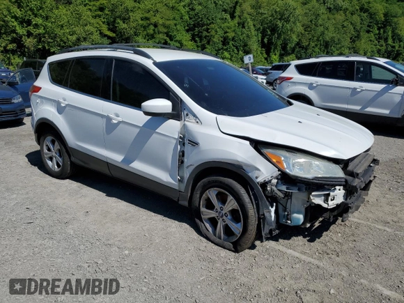 2013 Ford Escape SE z VIN 1FMCU9G99DUC73121, wystawiony jako Copart lot #57966605 z przebiegiem 169 764 mil mil oraz Szkoda całkowita • Salvage title. Historia ofert i sprzedaży dostępna na DreamBid. Obrazek 4.