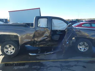 2014 Chevrolet Silverado 1500 LT with VIN 1GCRCREH5EZ165367, listed as a IAAI auction lot 41076729 with 130,425 mi miles and . Bid and sale history available at DreamBid. Image 13.