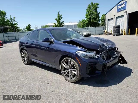 2023 BMW X6 M50i with VIN 5UXCY8C09P9P28422, listed as a Copart auction lot 52818133 with 4,131 mi miles and Salvage Title. Bid and sale history available at carsss.com. Image 11.