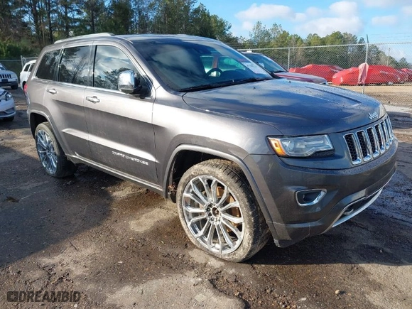 2014 Jeep Grand Cherokee Overland with VIN 1C4RJFCT8EC183165, listed as a IAAI auction lot 41298114 with 114,187 mi miles. Bid and sale history available at carsss.com. Image 1.