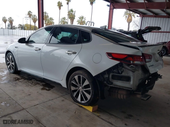 2017 Kia Optima SX with VIN 5XXGW4L2XHG136843, listed as a IAAI auction lot 41806606 with 157,899 mi miles. Bid and sale history available at carsss.com. Image 3.