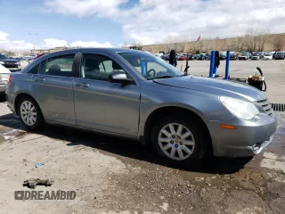 2010 Chrysler Sebring Touring with VIN 1C3CC4FB6AN162678, listed as a Copart auction lot 51256215 with 179,529 mi miles and Clean Title. Bid and sale history available at DreamBid. Image 4.