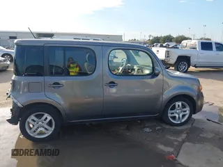 2013 Nissan Cube SL z VIN JN8AZ2KR8DT301092, wystawiony jako IAAI lot #41328574 z przebiegiem Nie podano mil oraz . Historia ofert i sprzedaży dostępna na DreamBid. Obrazek 14.