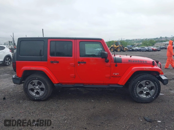 2017 Jeep Wrangler Unlimited Sahara with VIN 1C4HJWEG6HL609208, listed as a IAAI auction lot 42231634 with 87,466 mi miles and . Bid and sale history available at DreamBid. Image 14.