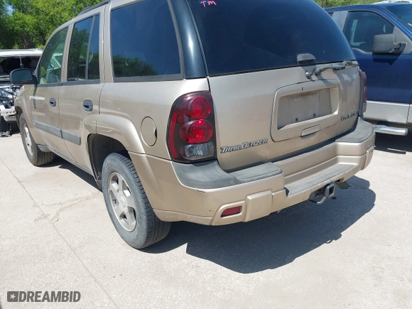 2004 Chevrolet TrailBlazer LS with VIN 1GNDT13S842332717, listed as a IAAI auction lot 41970692 with 261,212 mi miles. Bid and sale history available at carsss.com. Image 3.