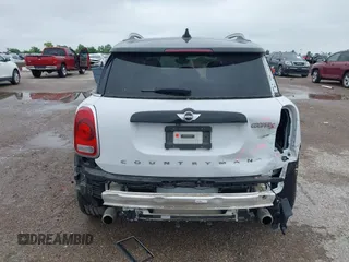 2018 MINI Countryman Cooper S z VIN WMZYT3C31J3D99568, wystawiony jako IAAI lot #42131017 z przebiegiem 54 992 mil mil oraz . Historia ofert i sprzedaży dostępna na DreamBid. Obrazek 16.
