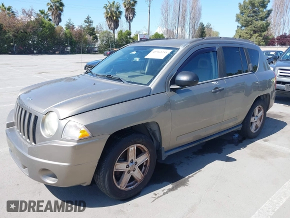 2007 Jeep Compass Sport with VIN 1J8FF47W87D241293, listed as a IAAI auction lot 41963241 with 251,852 mi miles. Bid and sale history available at carsss.com. Image 2.