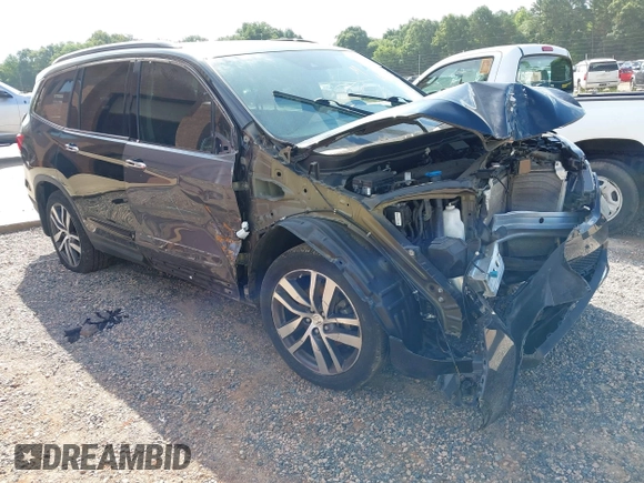 2017 Honda Pilot Touring with VIN 5FNYF5H91HB038268, listed as a IAAI auction lot 42786448 with 62,195 mi miles and . Bid and sale history available at DreamBid. Image 1.