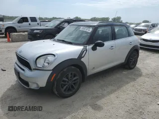 2014 MINI Countryman S with VIN WMWZC5C55EWM18087, listed as a Copart auction lot 68661614 with Not provided miles and Salvage title. Bid and sale history available at DreamBid. Image 1.