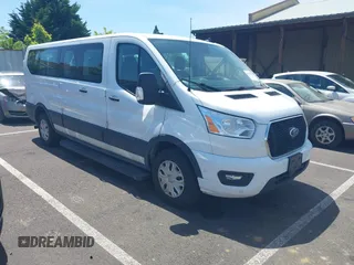 2021 Ford Transit Passenger XL with VIN 1FBAX2Y81MKA64794, listed as a IAAI auction lot 42227781 with 133,000 mi miles and . Bid and sale history available at DreamBid. Image 1.