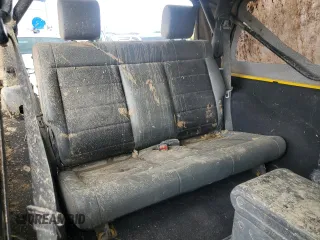 2009 Jeep Wrangler X with VIN 1J4FA24119L754391, listed as a Copart auction lot 56067805 with 118,117 mi miles and Salvage title. Bid and sale history available at DreamBid. Image 11.