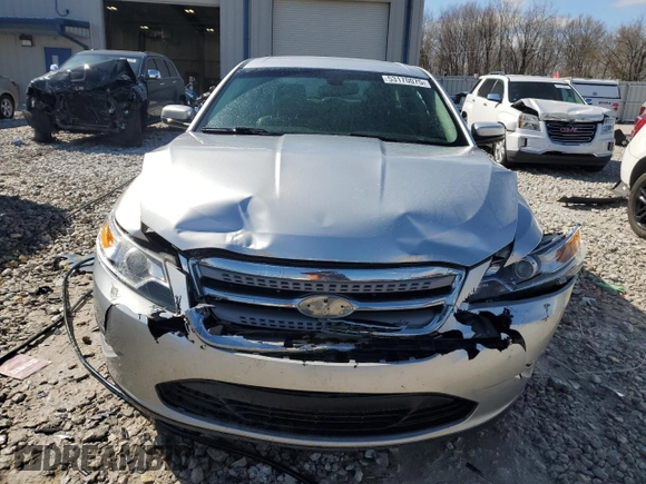 2012 Ford Taurus SEL z VIN 1FAHP2HW7CG138459, wystawiony jako Copart lot #53170075 z przebiegiem 194 617 mil mil oraz Czysty tytuł • Clean title. Historia ofert i sprzedaży dostępna na DreamBid. Obrazek 5.