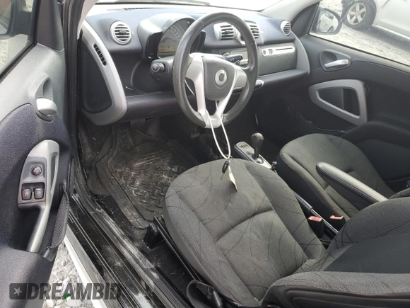 2014 Smart fortwo Pure с VIN WMEEJ3BA7EK761731, выставлен на аукционе Copart как лот 60268205 с пробегом 61 973 миль миль и Списание • Salvage title. История ставок и продаж доступна на DreamBid. Изображение 8.