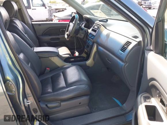2006 Honda Pilot EX-L with VIN 2HKYF18536H548948, listed as a IAAI auction lot 36572651 with 242,758 mi miles and . Bid and sale history available at DreamBid. Image 5.
