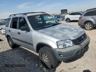 2001 Honda CR-V LX with VIN JHLRD284X1C000881, listed as a Copart auction lot 74606824 with 156,453 mi miles and Salvage Title. Bid and sale history available at carsss.com. Image 4.
