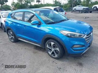 2017 Hyundai Tucson Sport z VIN KM8J33A26HU561526, wystawiony jako IAAI lot #41916401 z przebiegiem 107 601 mil mil oraz . Historia ofert i sprzedaży dostępna na DreamBid. Obrazek 1.